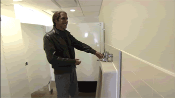conan-waxfigures-mensroom.gif